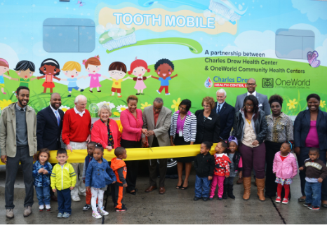 Tooth Mobile ribbon cutting.